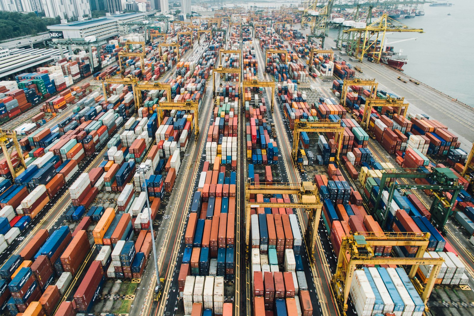 Container yard seen from above, rows of freight boxes
