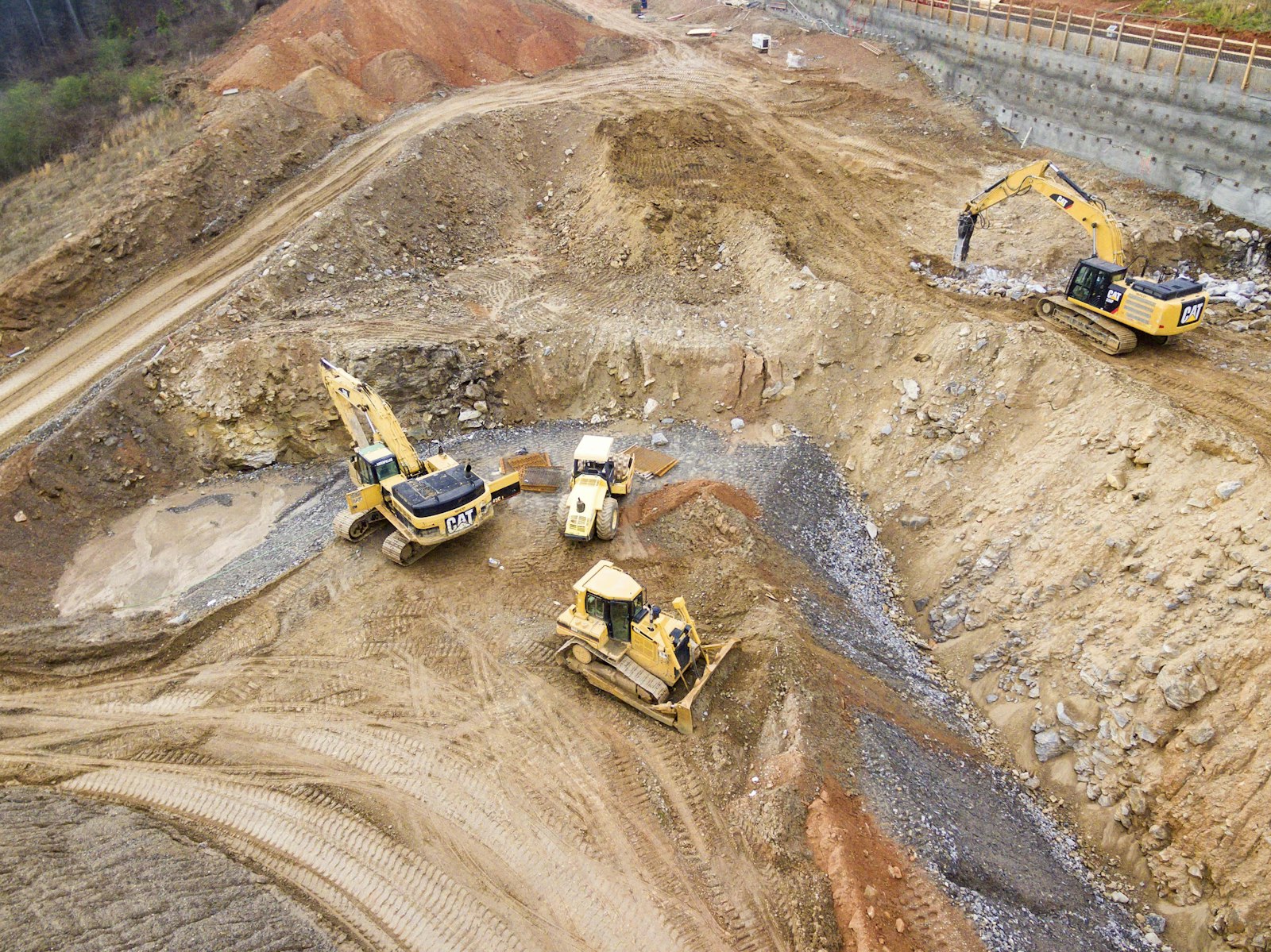Excavator and earthmoving plant on a dig site
