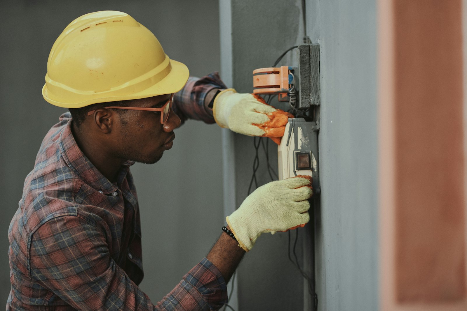 Electrician wiring a distribution board