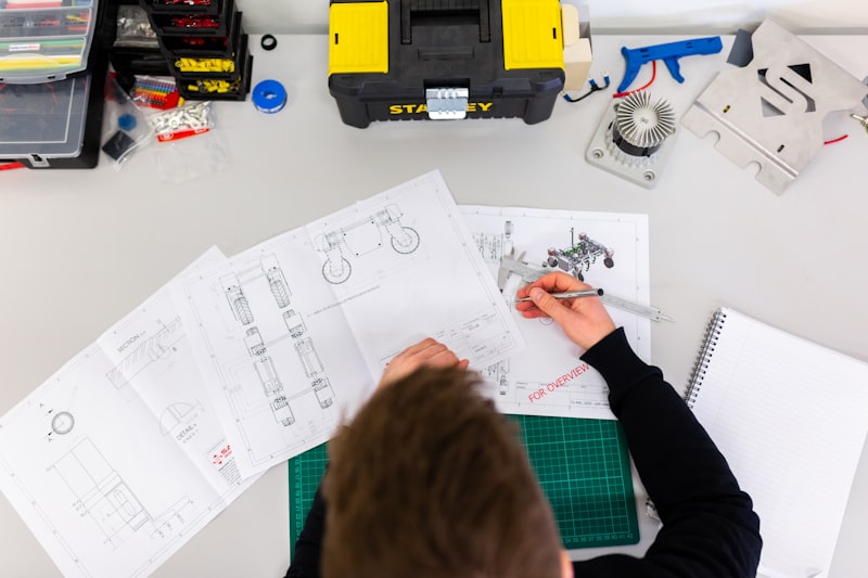Engineer studying technical drawings