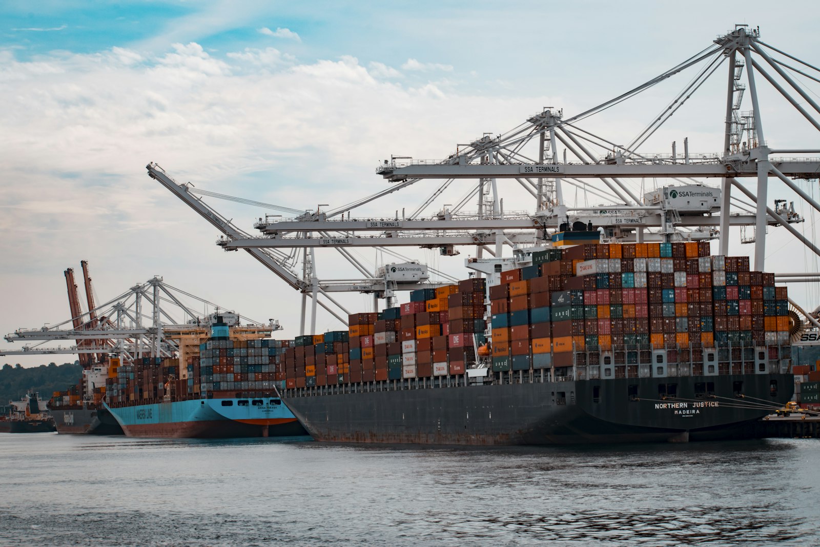 Ship-to-shore cranes working a container vessel