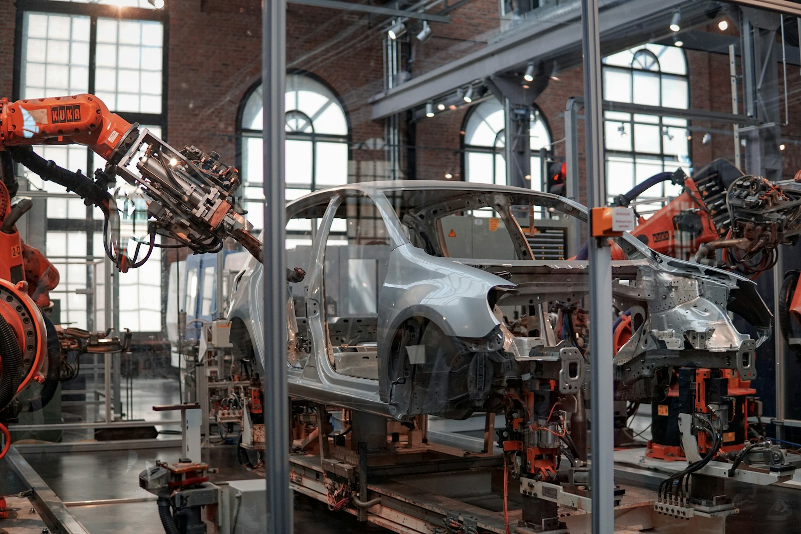 Industrial robot arm on an assembly line